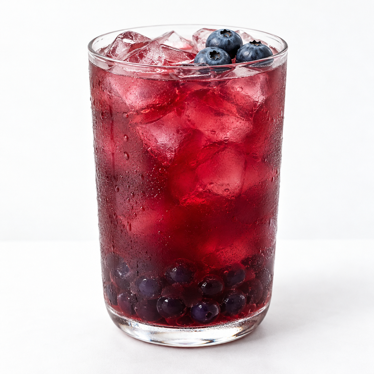 Hojalicious Blueberry Iced Tea with Popping Boba — serving suggestion