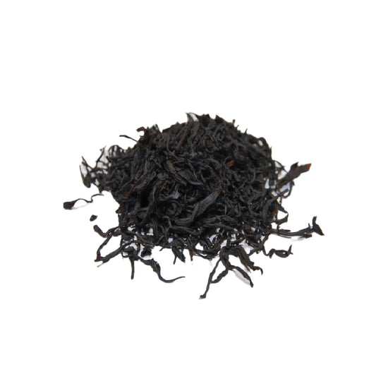 Loose leaf Premium Ruby Red Black Tea with long, twisted dark leaves suitable for premium black tea and milk tea bases.