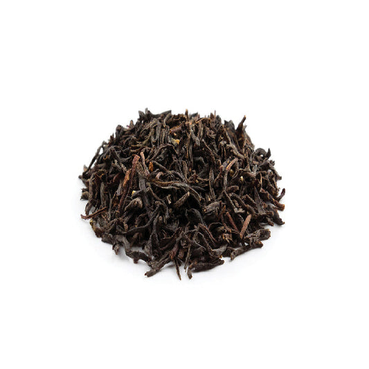 Heavily roasted dark Tie Guan Yin oolong tea leaves for espresso extraction.