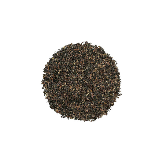 Close up of fine-cut dark brown Red Pu Erh Tea leaves for espresso extraction.